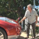 Vincent Selleck charging his EV Nissan Leaf